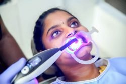 patient undergoing restoration at dental care in coimbatore