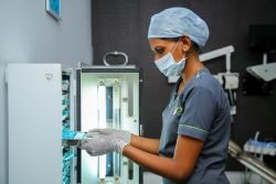 dental assistant taking surgical instruments of dental care in Coimbatore